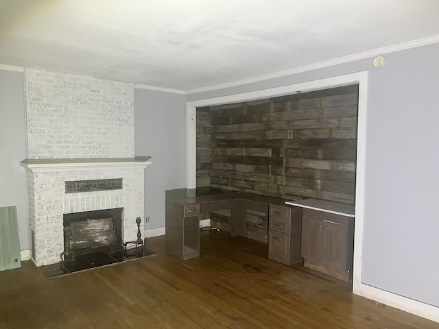 bar featuring a brick fireplace, dark wood-type flooring, and ornamental molding