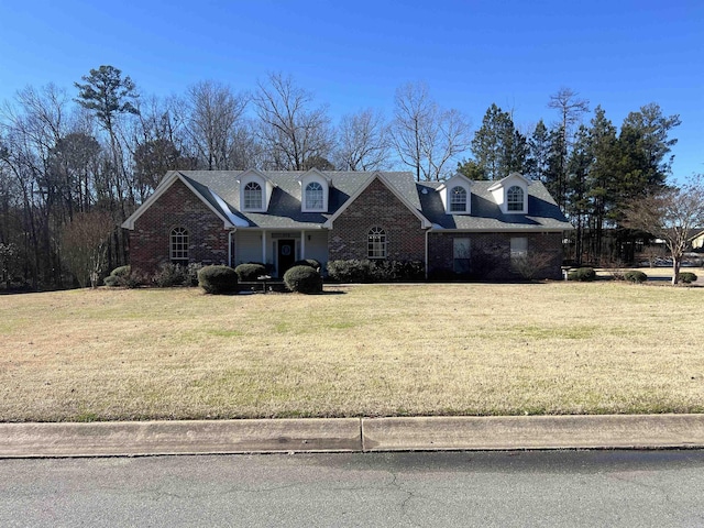 view of front of home featuring a front yard