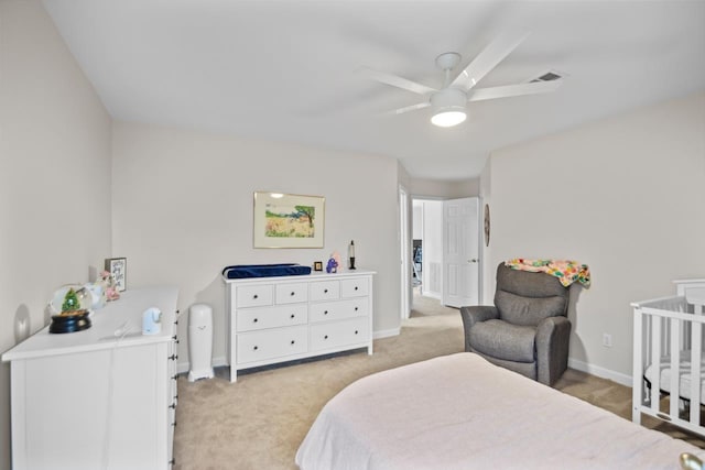 carpeted bedroom featuring ceiling fan