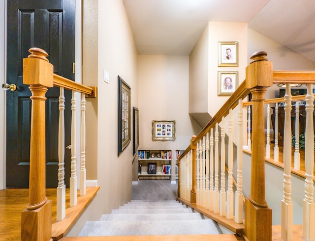 stairway with wood-type flooring