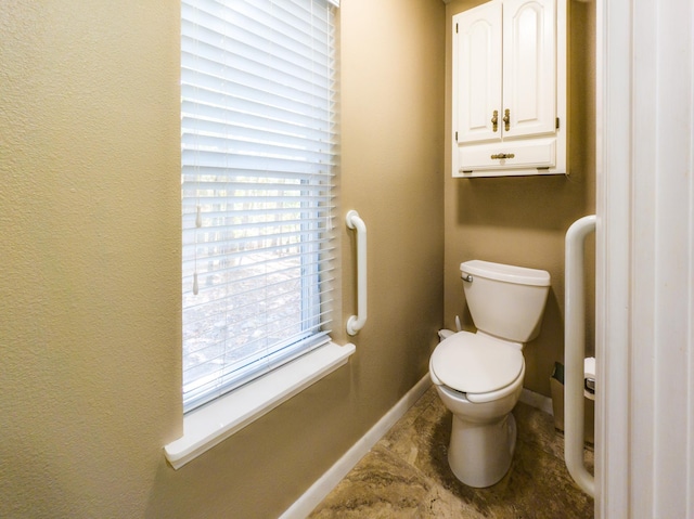 bathroom featuring toilet