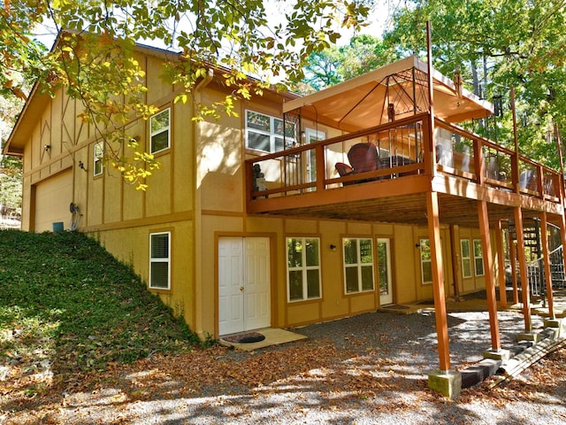 rear view of house with a deck