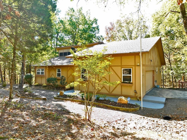 exterior space with a garage