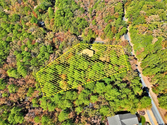 birds eye view of property with a rural view