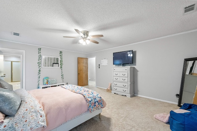 bedroom featuring ceiling fan, light colored carpet, a textured ceiling, and crown molding