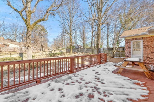 view of snow covered deck