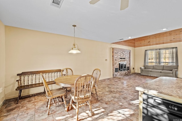 dining room featuring ceiling fan and wine cooler