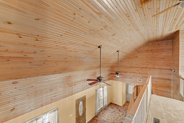 details with carpet, ceiling fan, wooden walls, and wooden ceiling