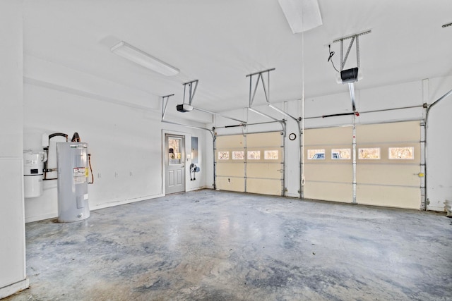 garage with water heater and a garage door opener