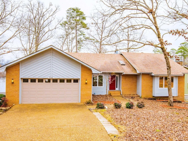 ranch-style home featuring a garage