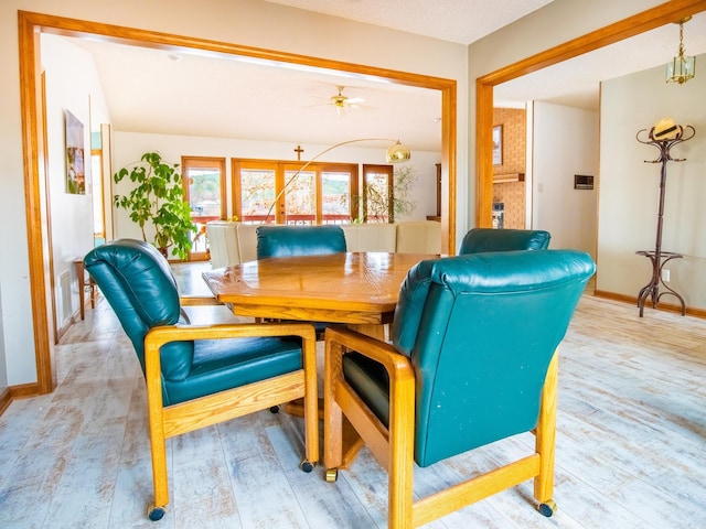 dining area featuring ceiling fan and light hardwood / wood-style floors