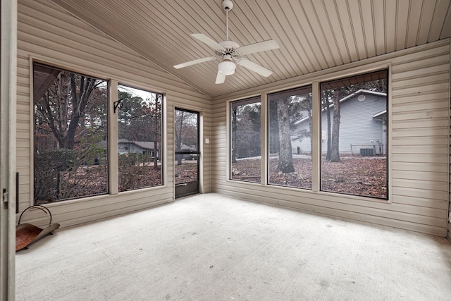 unfurnished sunroom featuring ceiling fan, lofted ceiling, and wooden ceiling