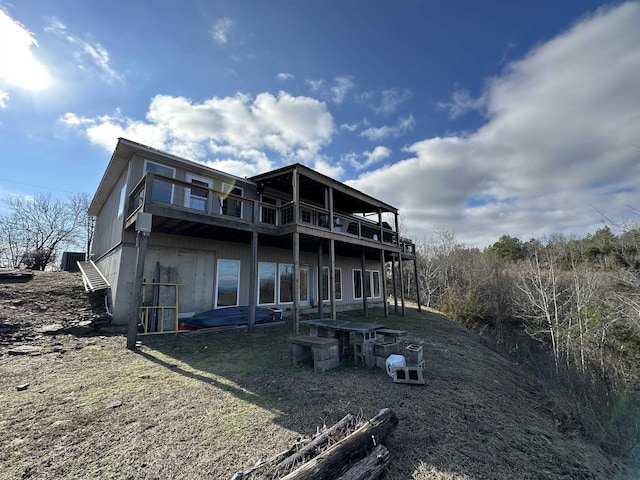 back of house featuring central air condition unit