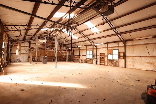 miscellaneous room featuring lofted ceiling