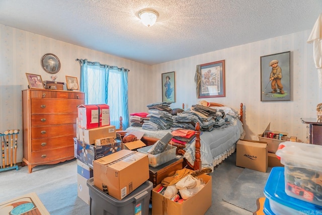 carpeted bedroom with a textured ceiling