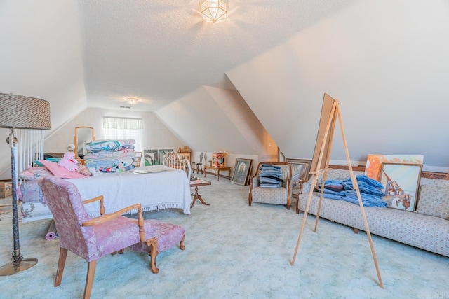 bedroom featuring carpet floors, a textured ceiling, and vaulted ceiling