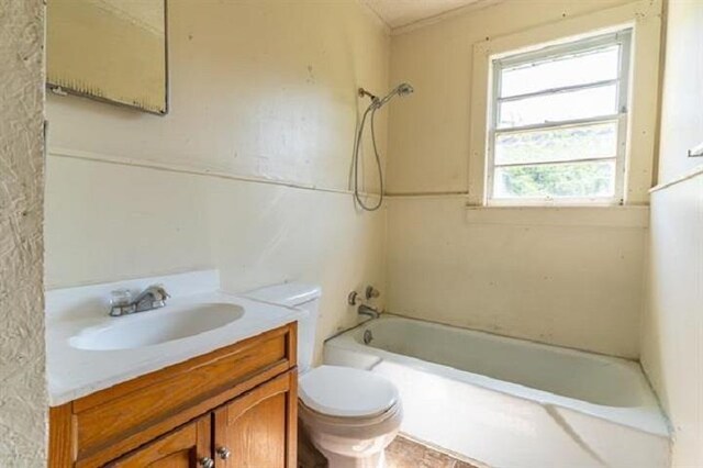 full bathroom with toilet, vanity, and shower / tub combination