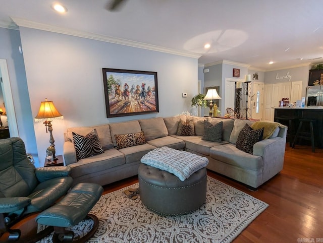 living room featuring ornamental molding and hardwood / wood-style floors