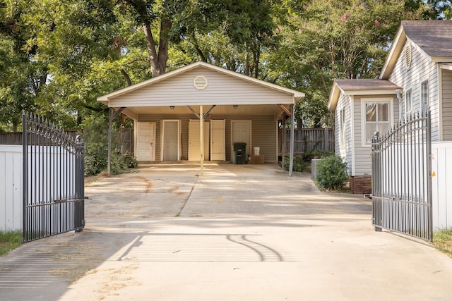 view of gate with a carport