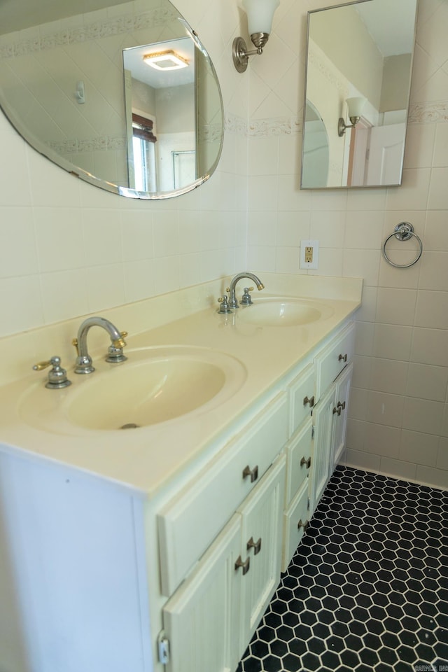 bathroom with tile walls, backsplash, and vanity