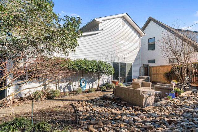 view of side of property featuring an outdoor hangout area