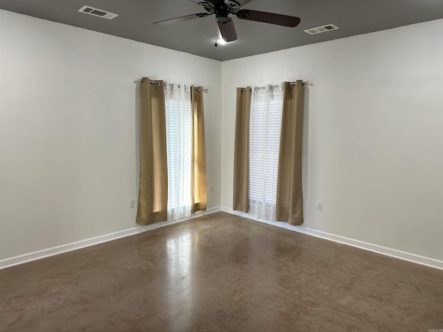 empty room featuring ceiling fan