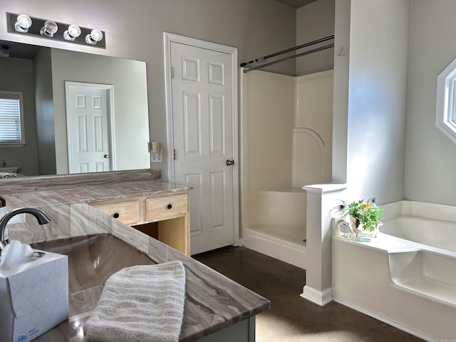 bathroom with vanity and plus walk in shower