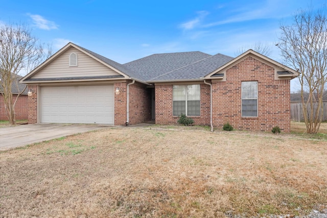 single story home with a front lawn and a garage