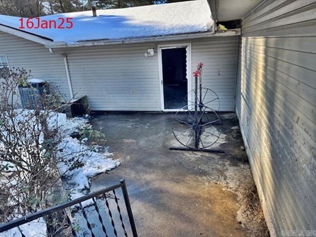 view of snow covered patio