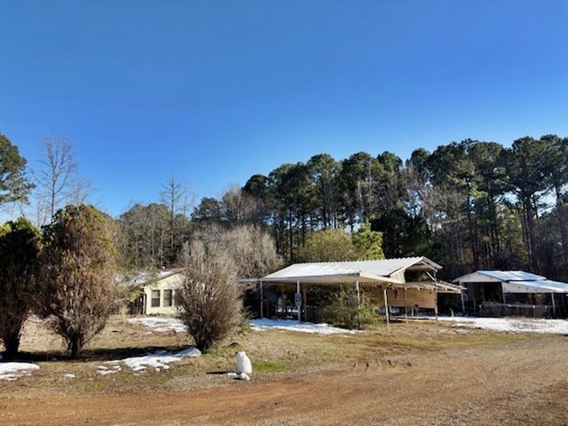 view of front facade with a carport