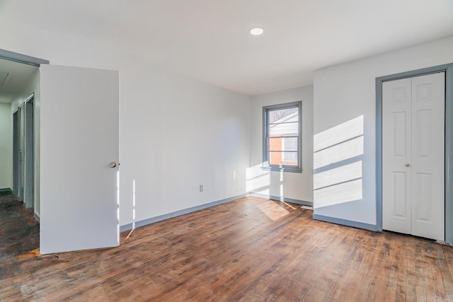 interior space with hardwood / wood-style floors