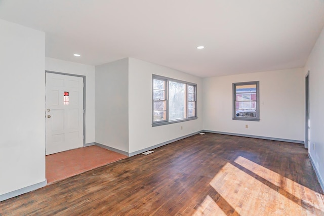 foyer with dark hardwood / wood-style flooring