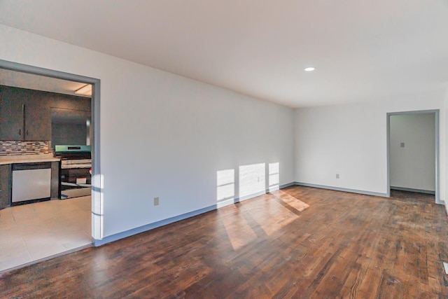 unfurnished room featuring hardwood / wood-style flooring