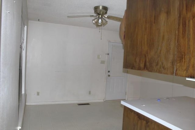 empty room with ceiling fan