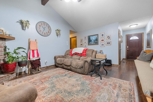 living room with dark hardwood / wood-style flooring and vaulted ceiling with beams