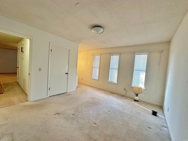 interior space featuring a textured ceiling