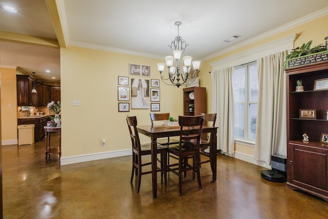 dining space featuring sink, crown molding, and an inviting chandelier