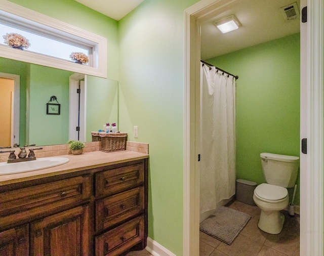 bathroom featuring toilet, tile patterned flooring, a shower with curtain, and vanity