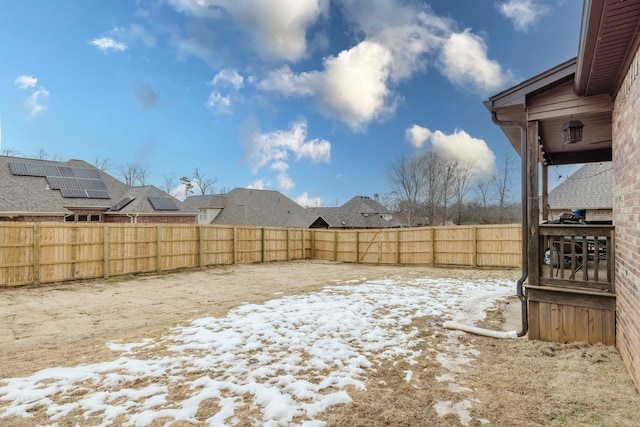 view of yard covered in snow