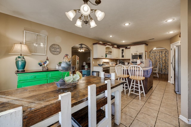 dining space with light tile patterned floors