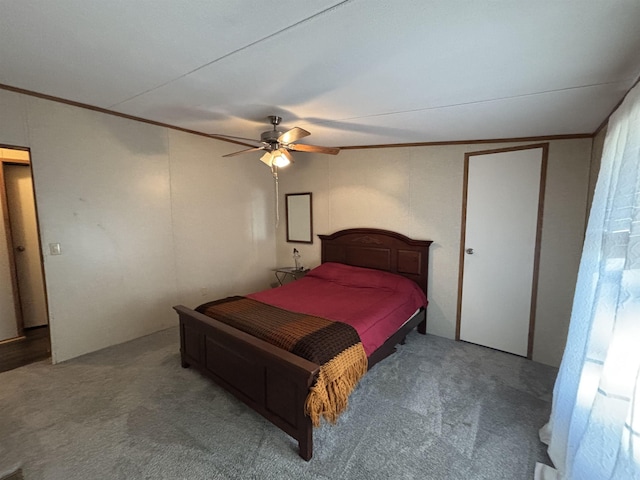 bedroom with ceiling fan and carpet floors