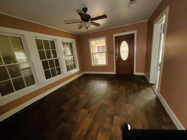 foyer entrance featuring ceiling fan and dark hardwood / wood-style flooring