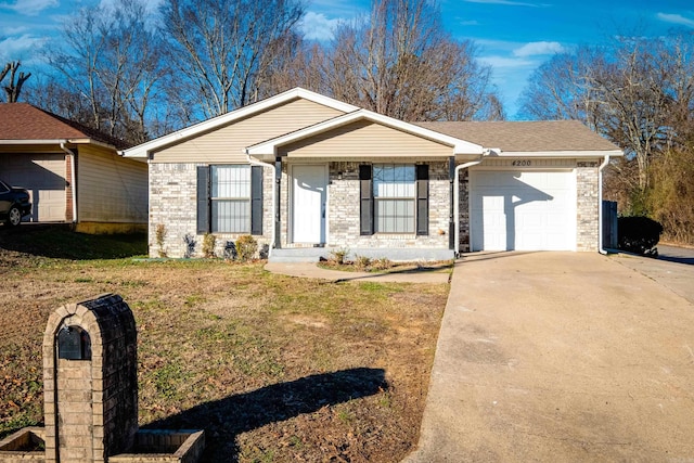 ranch-style home with a front yard and a garage