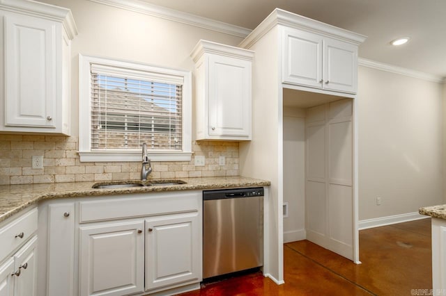 kitchen with stainless steel dishwasher, light stone countertops, sink, and white cabinetry