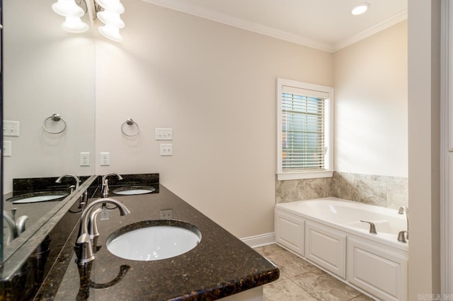 bathroom featuring tile patterned floors, vanity, ornamental molding, and a tub to relax in