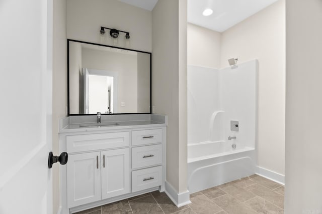 bathroom featuring vanity and bathing tub / shower combination