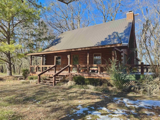 view of front of property featuring covered porch