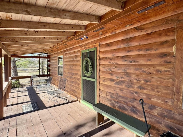 wooden terrace featuring a porch