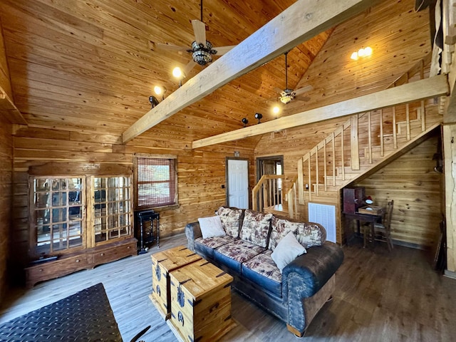 living room with ceiling fan, beamed ceiling, dark hardwood / wood-style flooring, and high vaulted ceiling