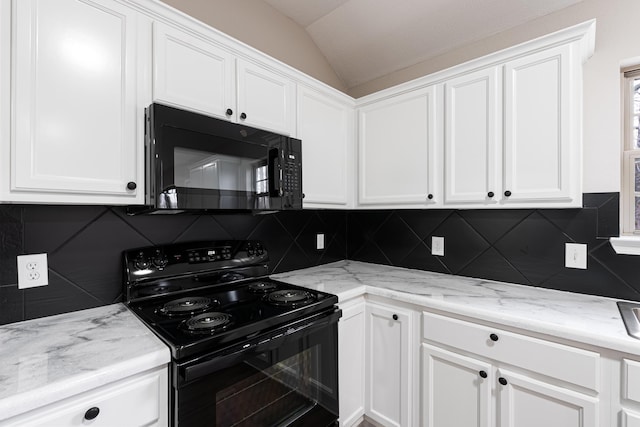 kitchen featuring vaulted ceiling, backsplash, white cabinets, and black appliances